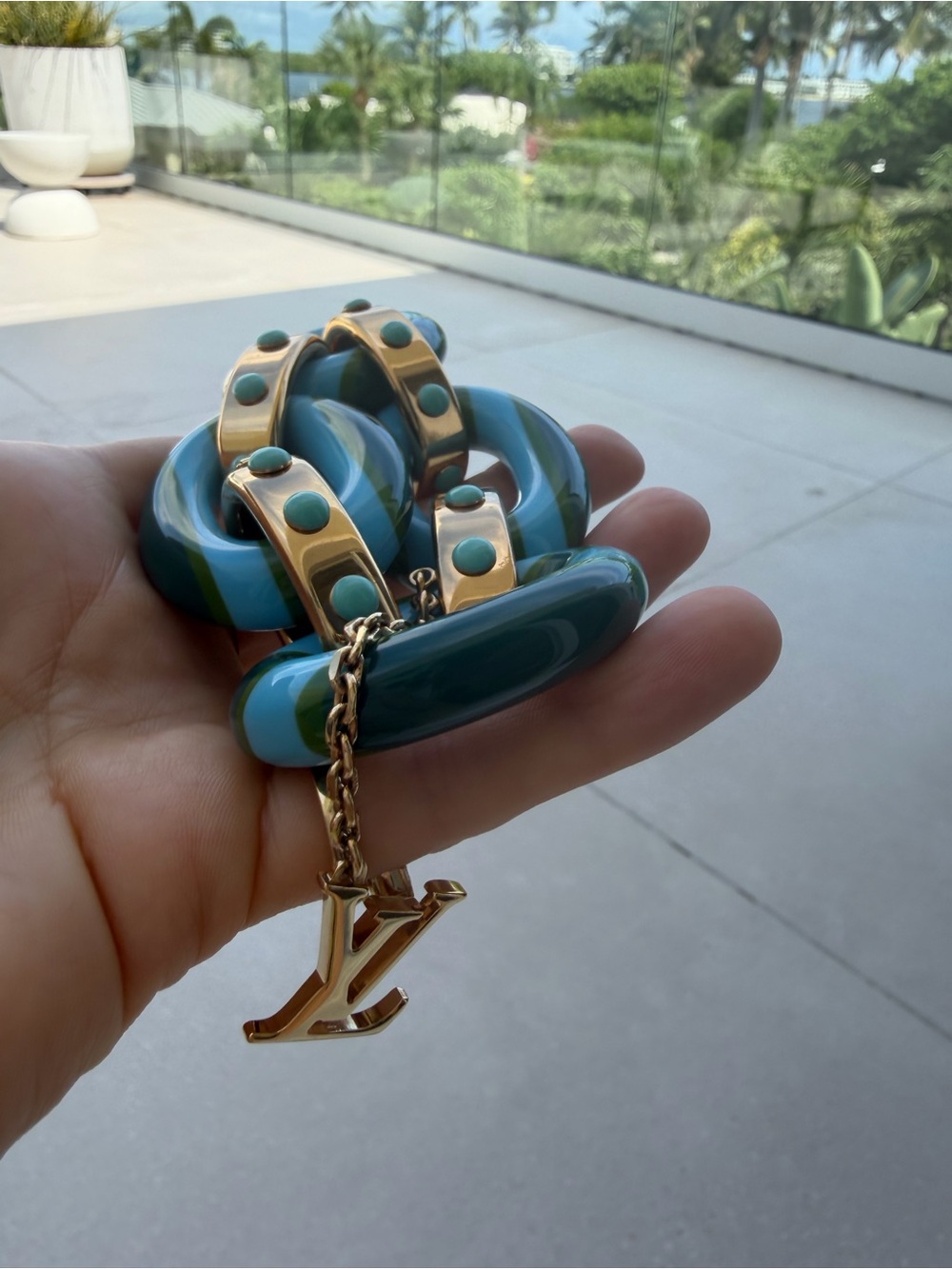 Louis Vuitton Blue and Turquoise Striped Resin Bracelet with Gold LV Charm - Picture 11 of 13
